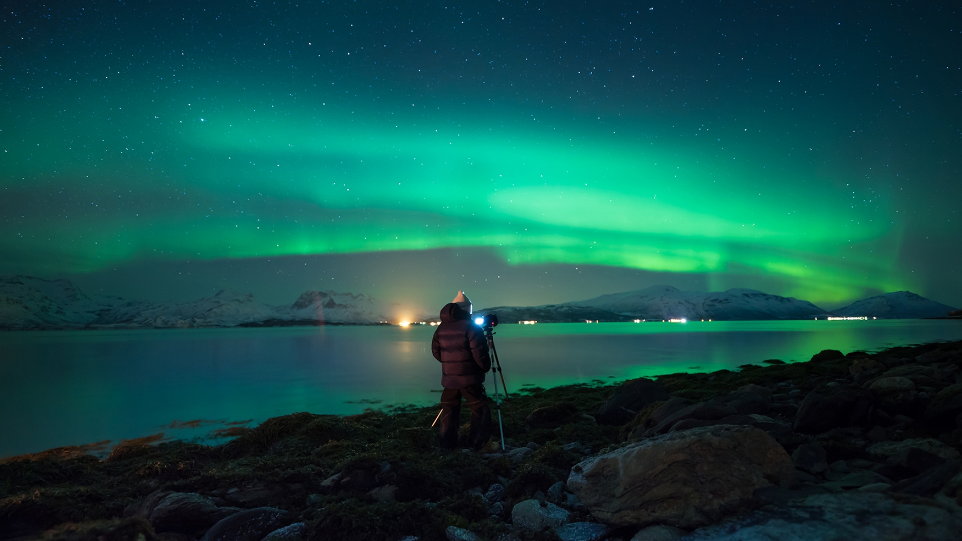 Person photographing the northern lights