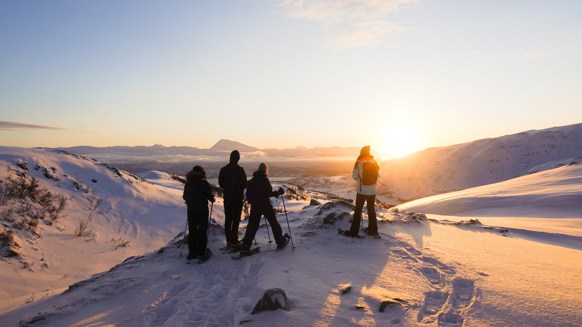 People snowshoeing in Tromso