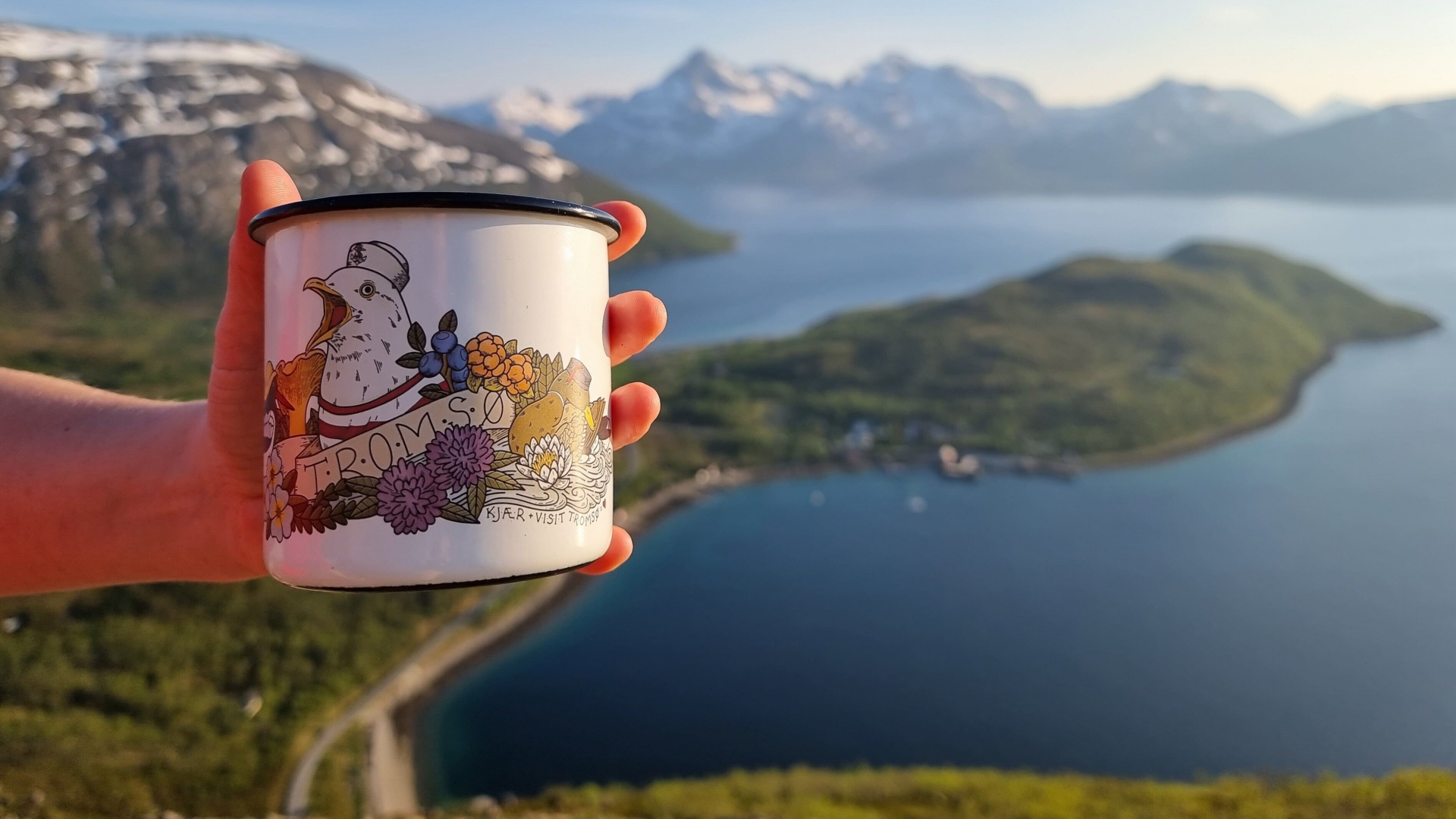 Enamel cup on a mountain top