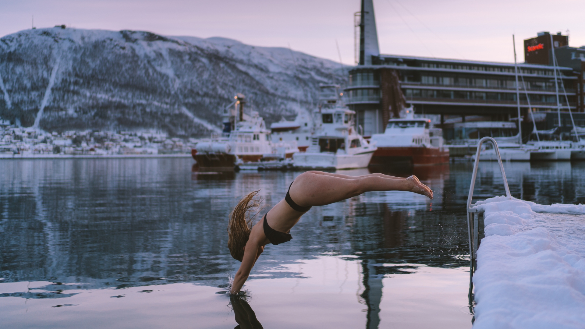 Girl diving in Tromsø