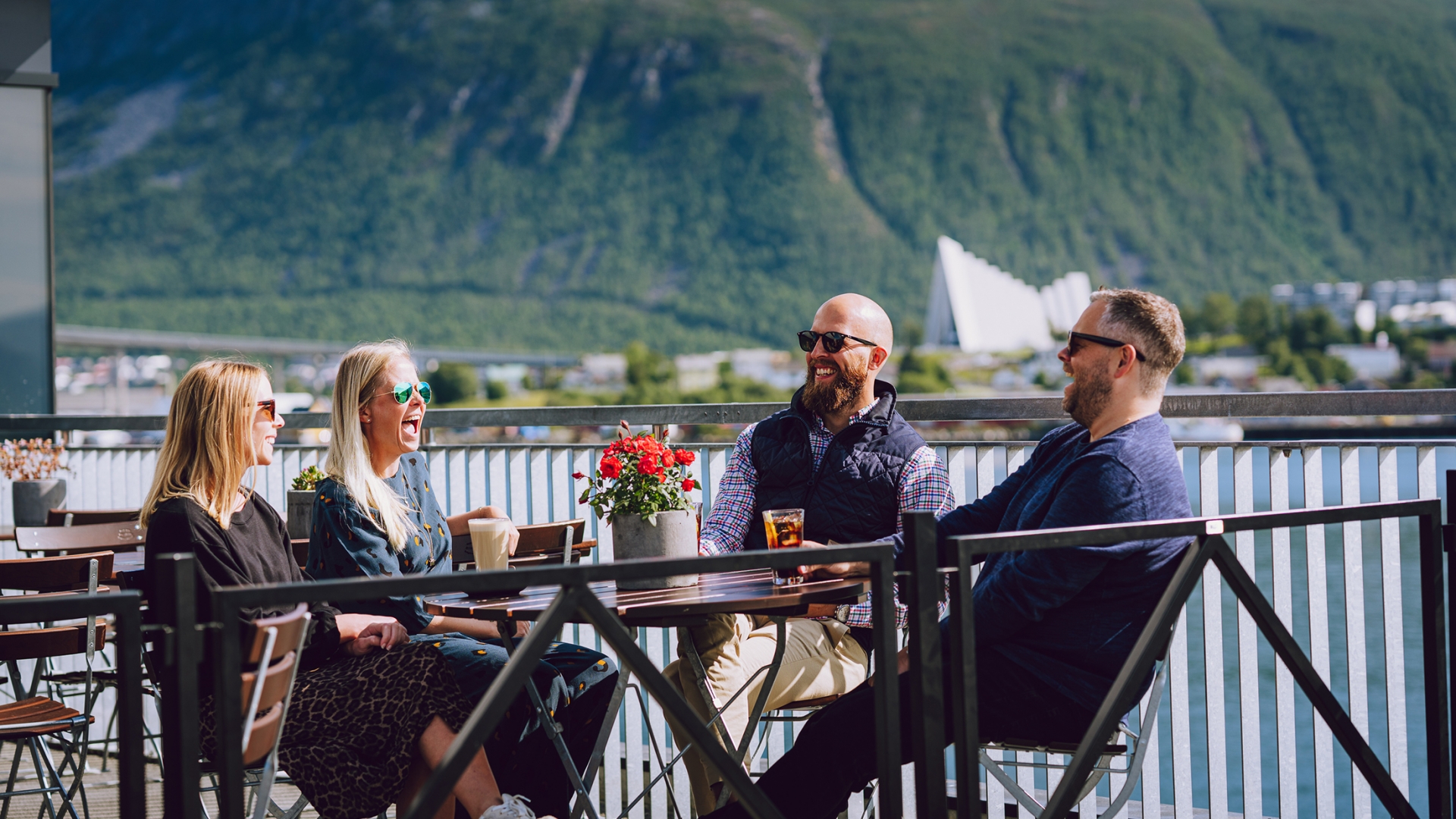 Friends having coffee at a cafe in Tromsø