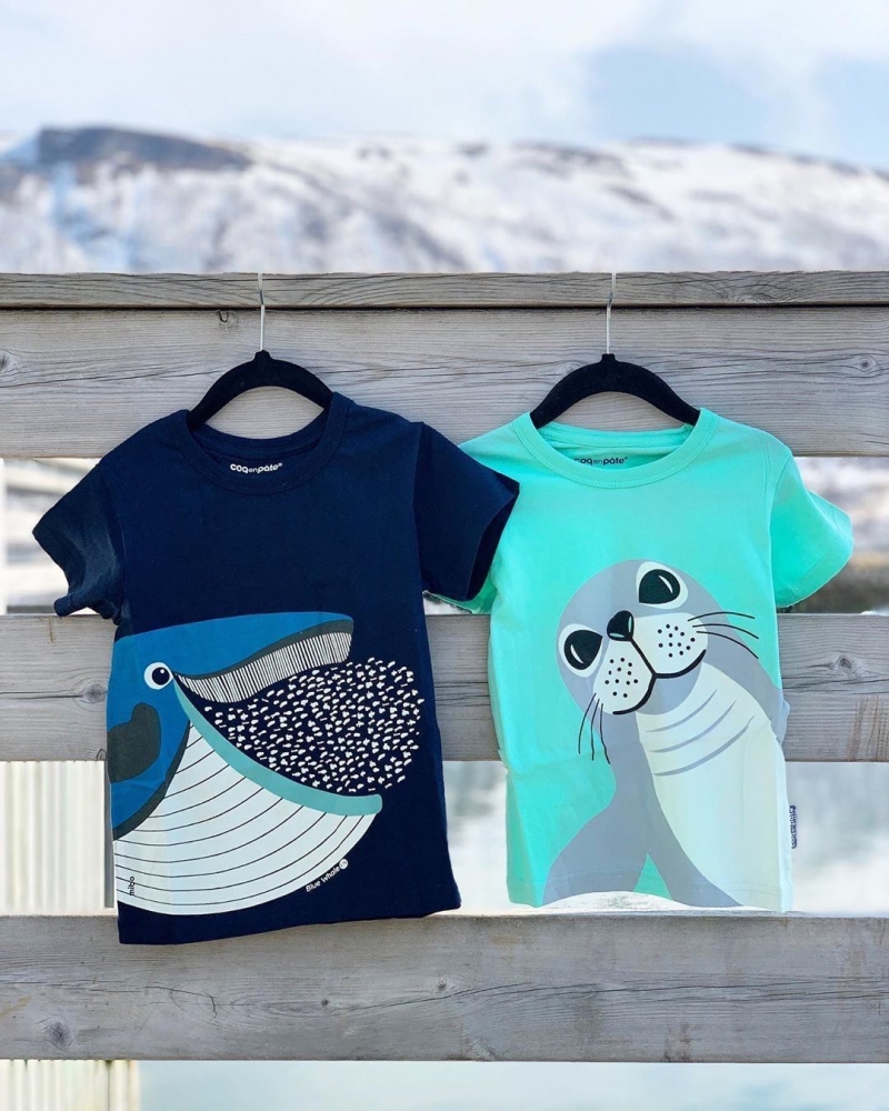 One t-shirt with a whale print and one with a seal print
