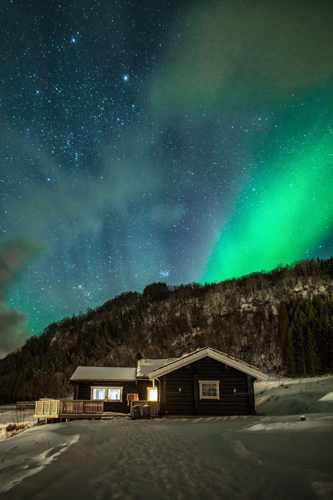 Northern Lights above a house
