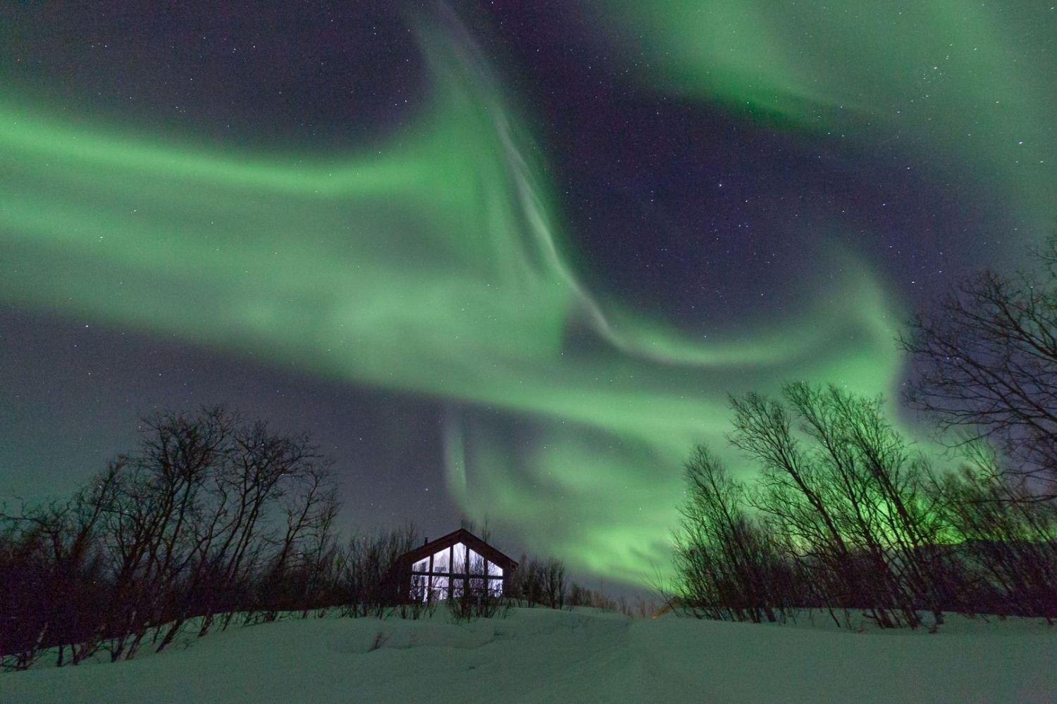 northern lights and cabin