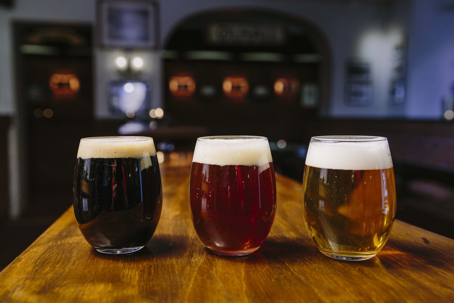 Three glasses of different kinds of beer