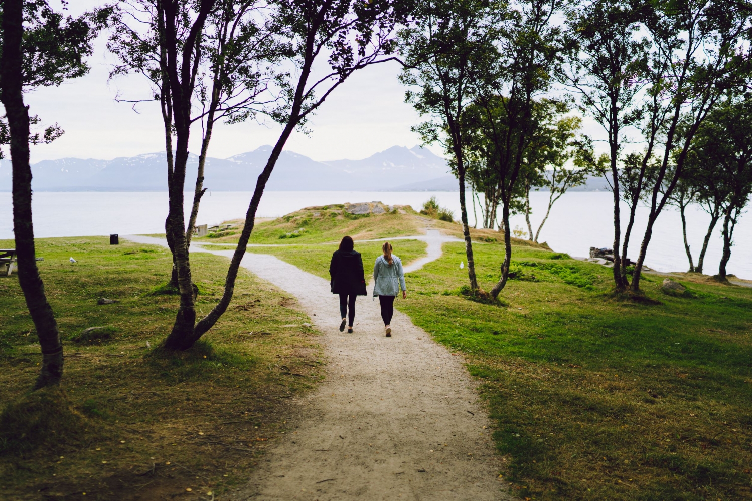 two people walking along the trails