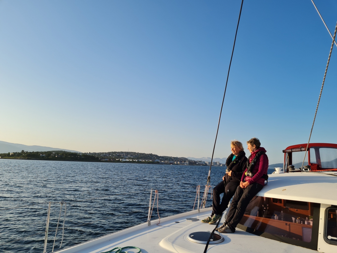 two women on board the catamaran on deck