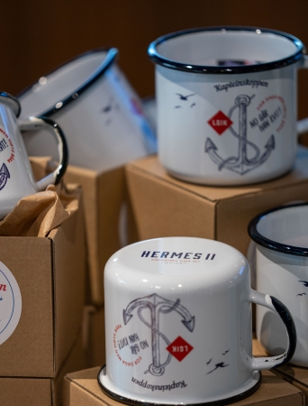 Cups with Hermes 2 logo