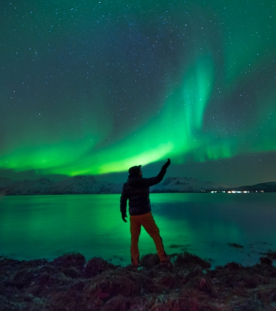 Man watching the Northern Lights