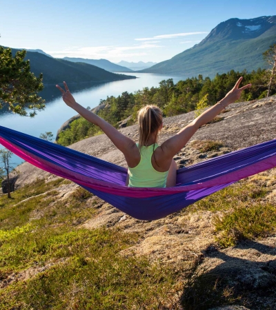 Girl in hammock with views over Narvik nature