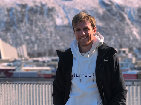 Mann som smiler i Tromsø