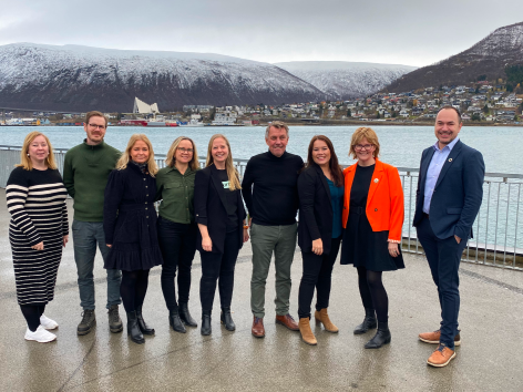 Group of people in Tromsø with a view towards the Arctic Cathedral