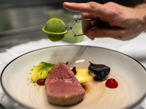 Plate with local food on a restaurant in Tromso