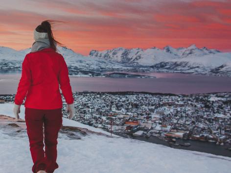 Person hiking in Tromsø in sunset