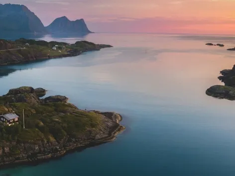 View of several islands with fjord and sunset