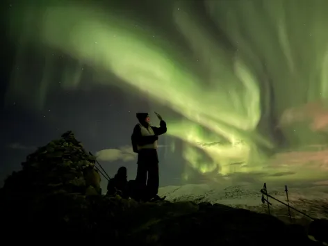 Guests looking at the Northern lights