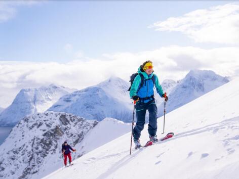 people go skiing in the mountains in Tromsø Ski Guides