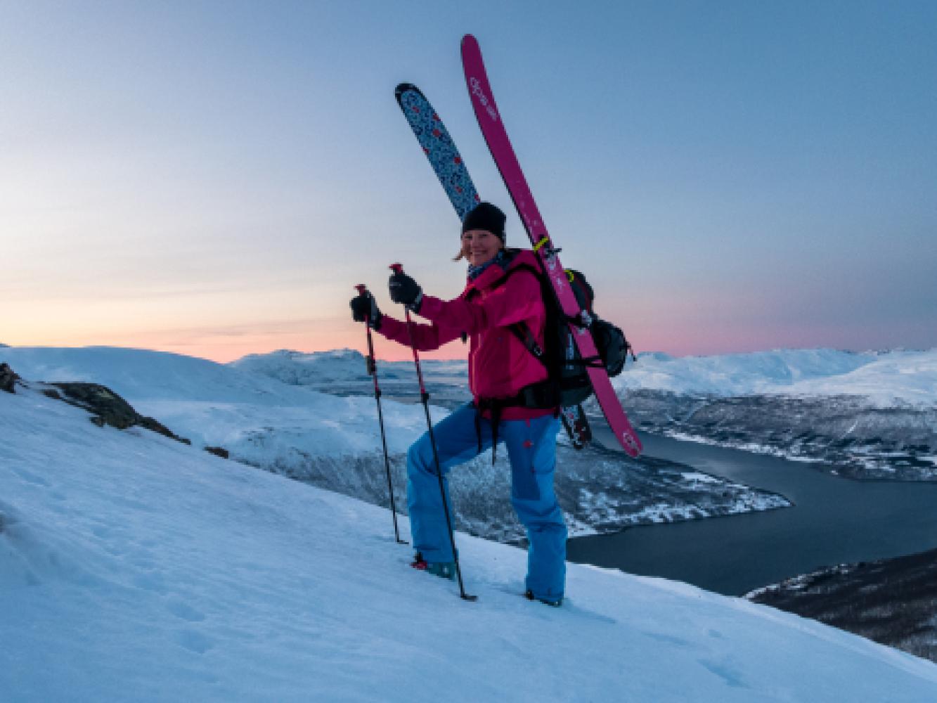 Woman om a ski touring trip in the Tromso region