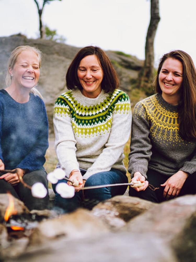 Girls by bonfire in Telgrafbukta in Tromsø 