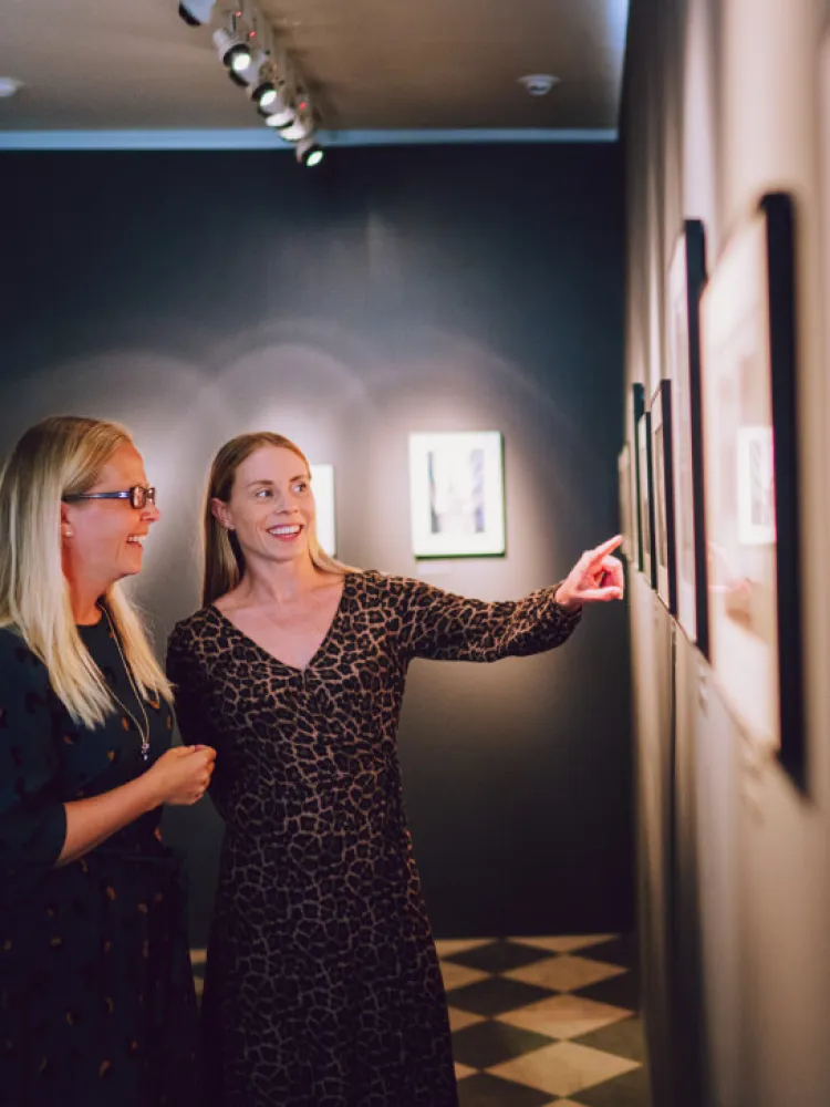 Friends at an art exhibition