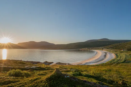 The sun shines on the beach