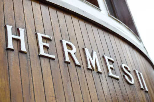 Hermes II Hermes ll logo on boat