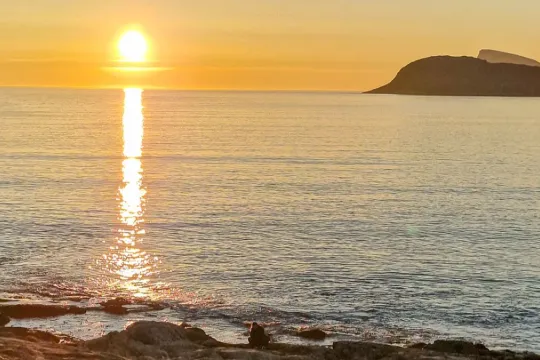 Sunset by the shoreline