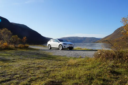 Car in fjordlandscape