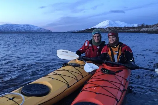 Two people in kayaks
