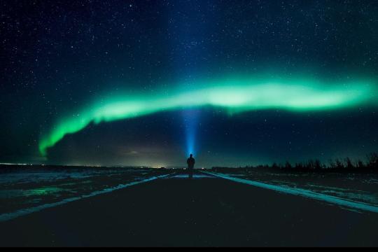 Person under the northern lights
