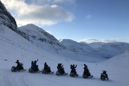 Snowmobiles in Arctic winterlandscape north of Tromso