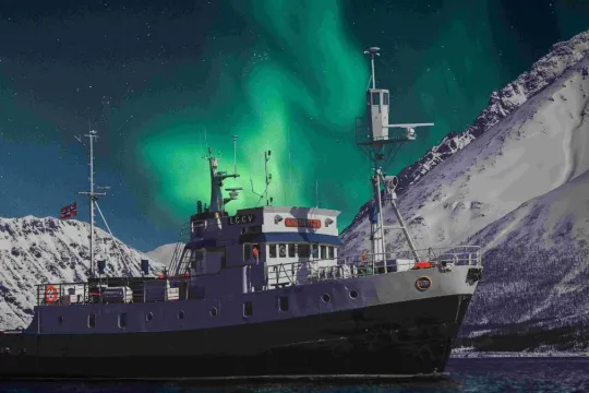 Northern Light Cruise on a Cozy Vintage Vessel