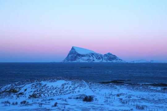 The mountain Håja in winter light outside of Tromsø