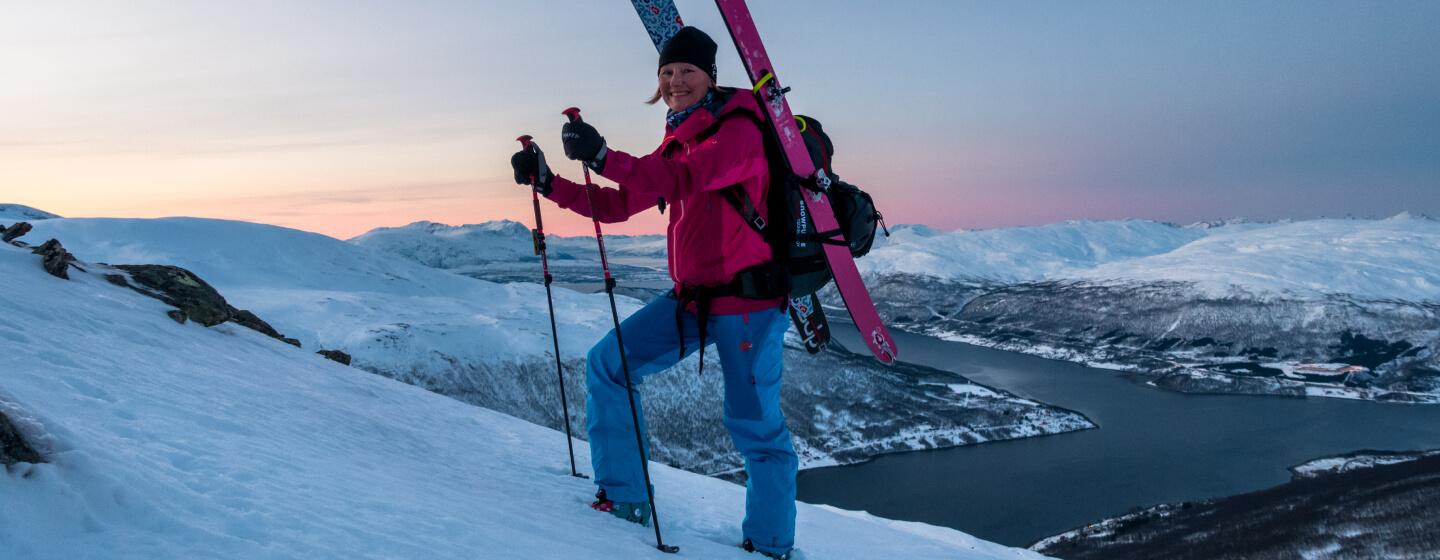 Woman om a ski touring trip in the Tromso region