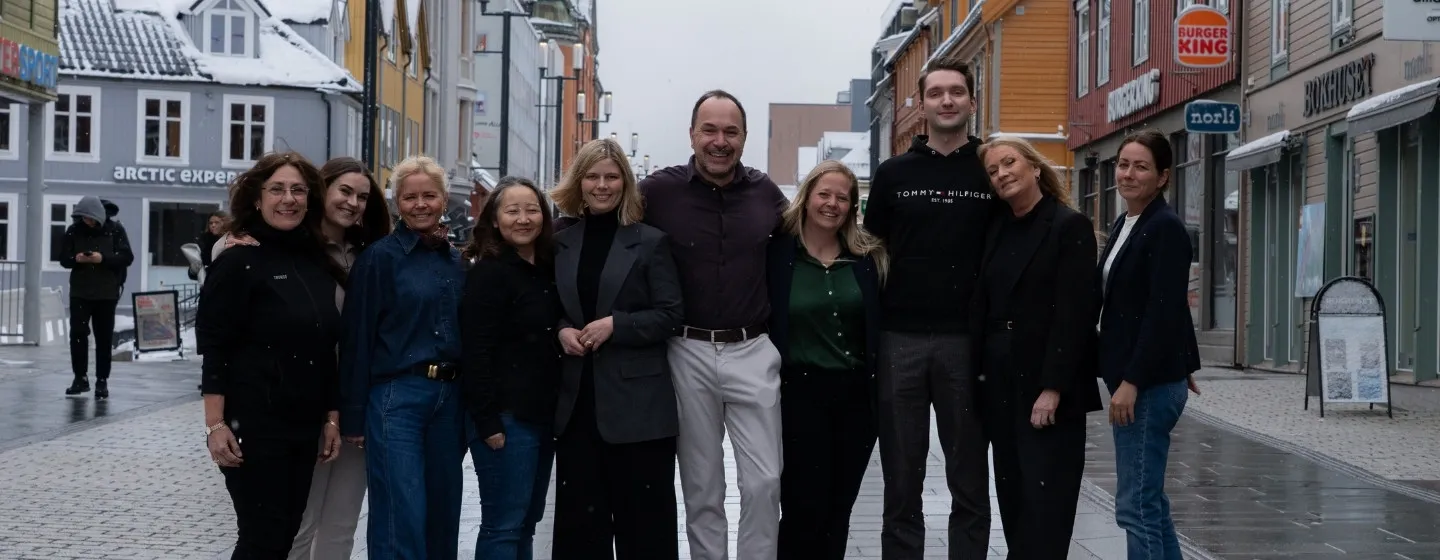 Employees at Visit Tromsø-Region standing outside in Storgata