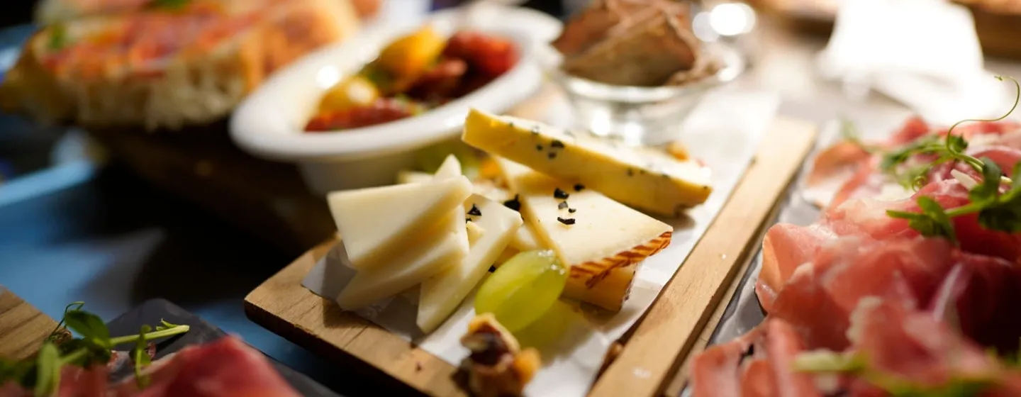 Selection of cheeses and cured meats at T-Tapas in Tromsø