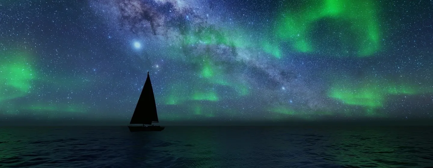 En seilbåt under nordlyset