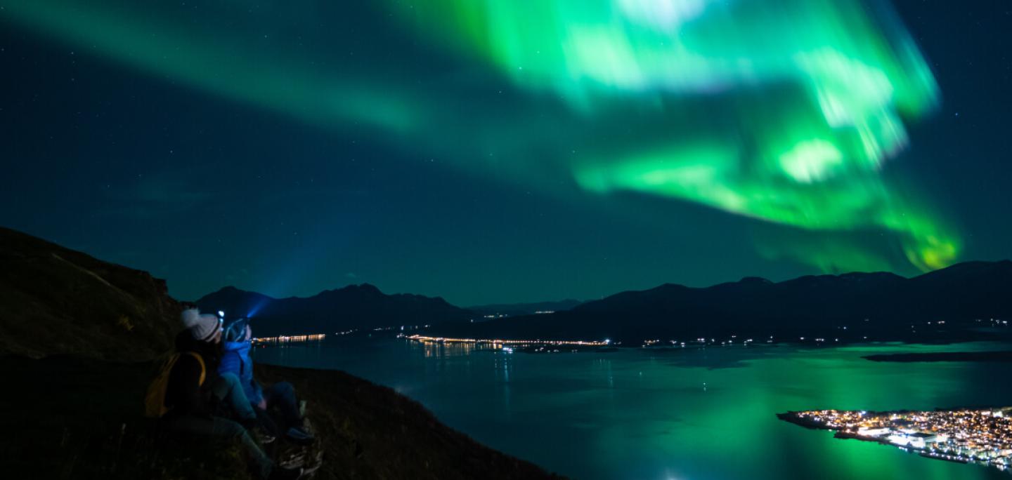 Gazing at the northern lights above Tromsø