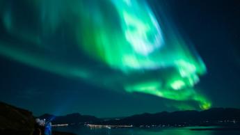 Gazing at the northern lights above Tromsø