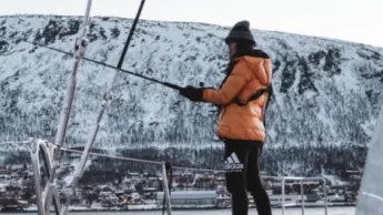 Woman fishing on a boat